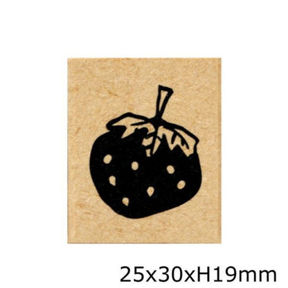 Rubber stamp with a strawberry design on a beige background