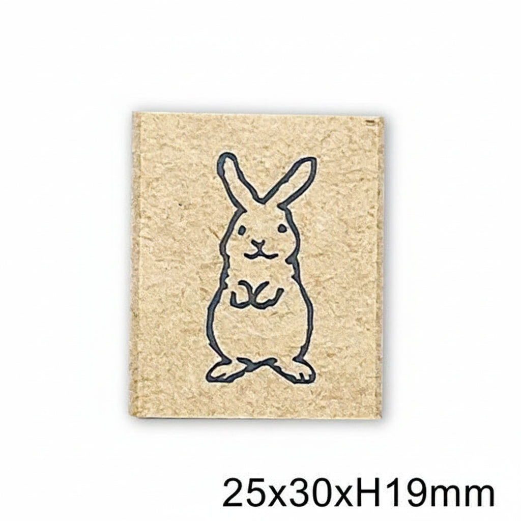 Rubber stamp with a rabbit design on a beige background