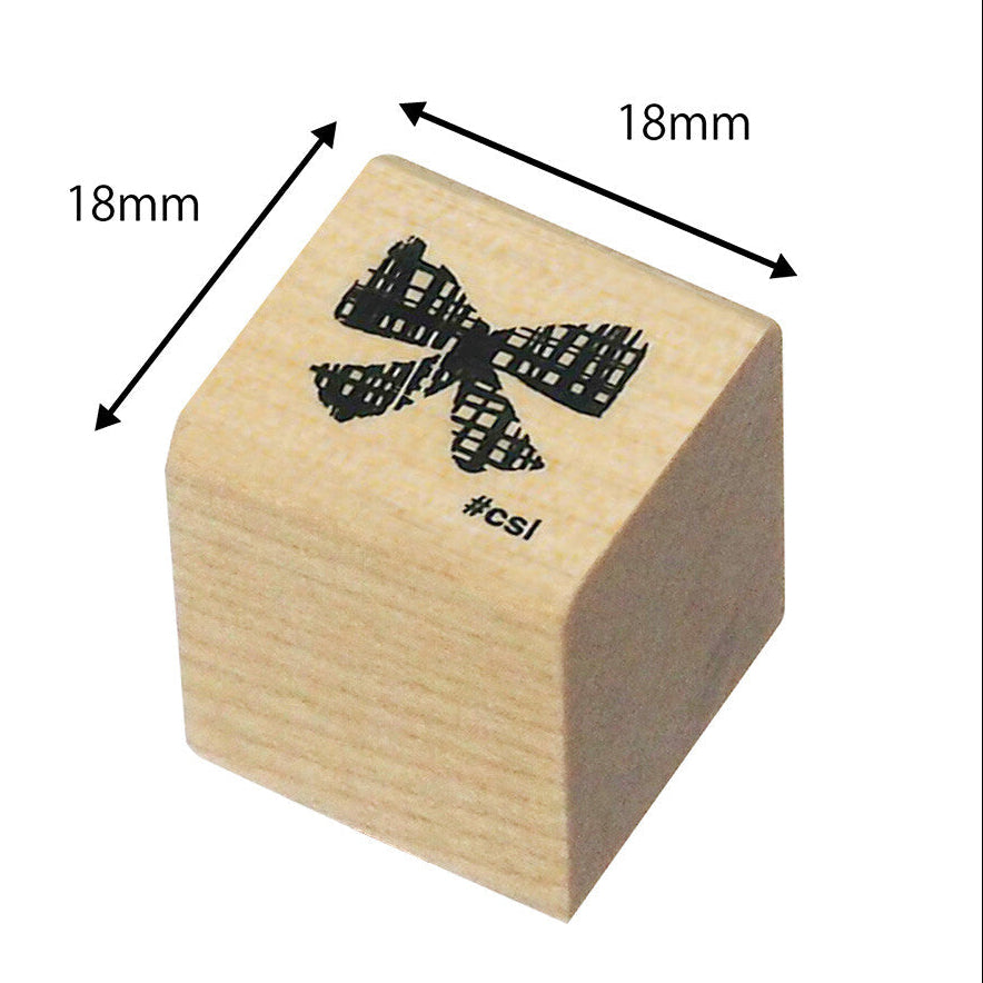 Wooden stamp with ribbon design and dimensions on a white background