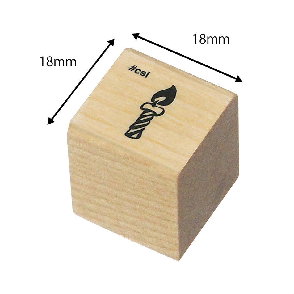 Wooden stamp of a lit candle with dimensions labeled on a white background