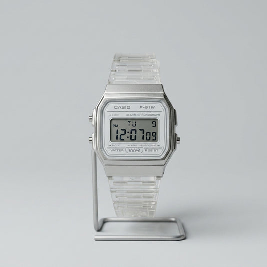 Silver Casio digital watch on a light gray background