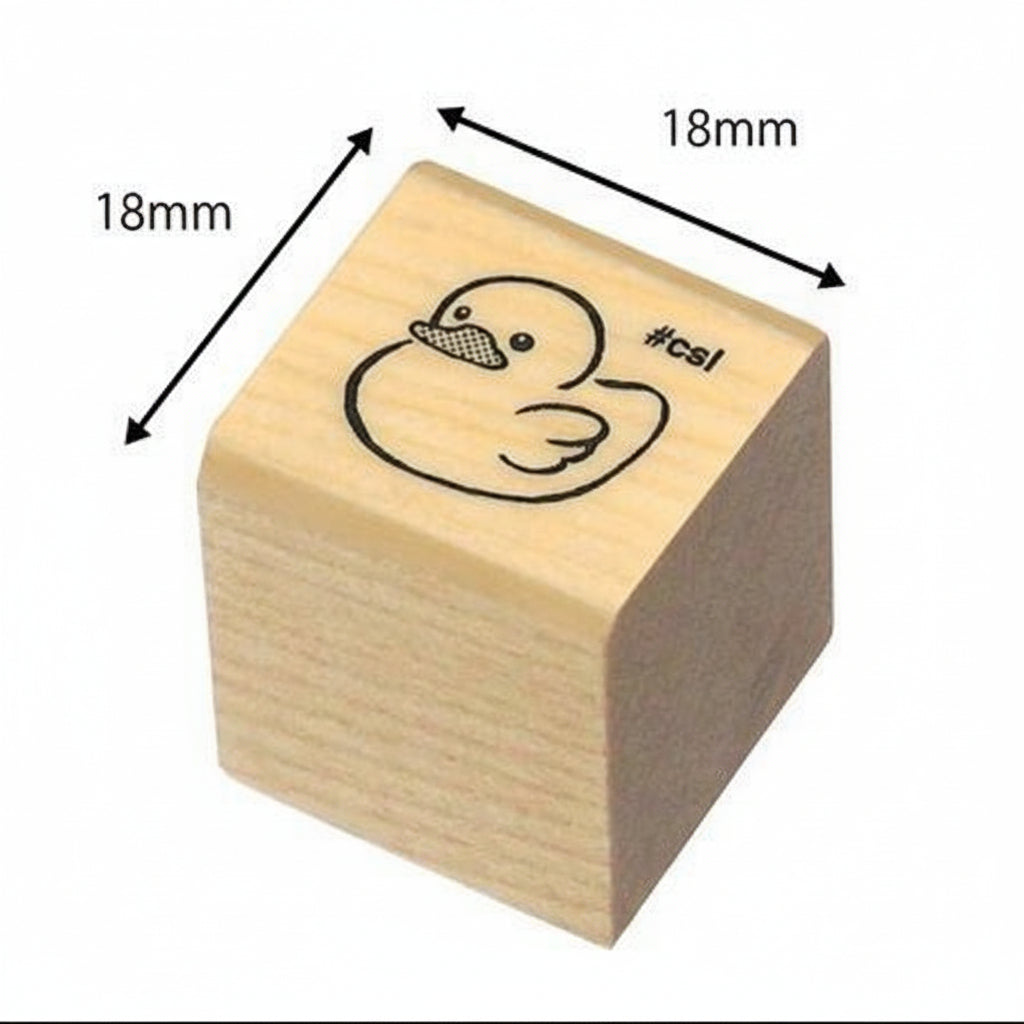Wooden stamp with a rubber duck design and dimensions labeled on a white background