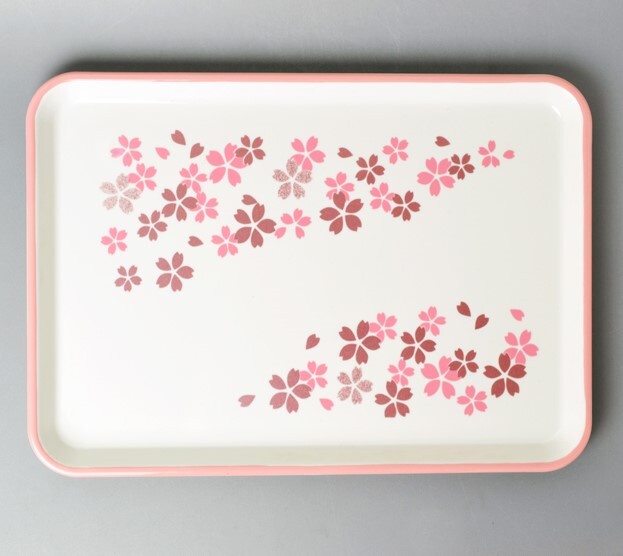 Rectangular tray with pink floral pattern on a gray background