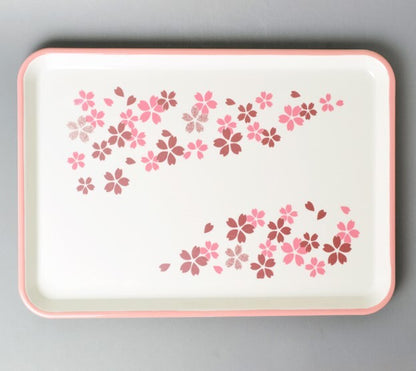 Rectangular tray with pink floral pattern on a gray background