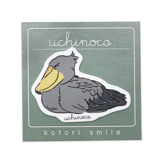 Sticker of a bird with 'uchinoco' branding on a green background