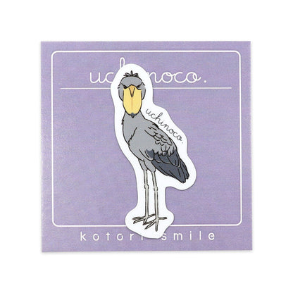Sticker of a bird with 'uchinoco' text on a purple background
