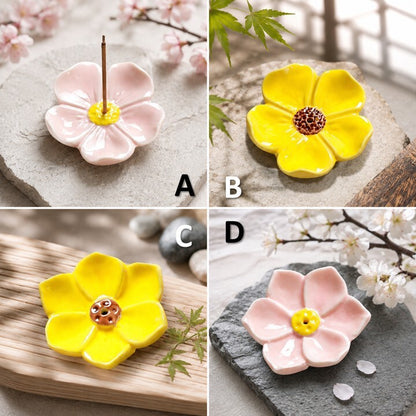 Four-panel collage showing two flower-shaped incense holders: a pale pink one with a gold center and a yellow one with a brown-and-gold center, each with an incense stick inserted. Panels include styled stone, wood, and cherry blossom backgrounds.