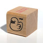 Wooden stamp with a duck design and 'cal' branding on a white background